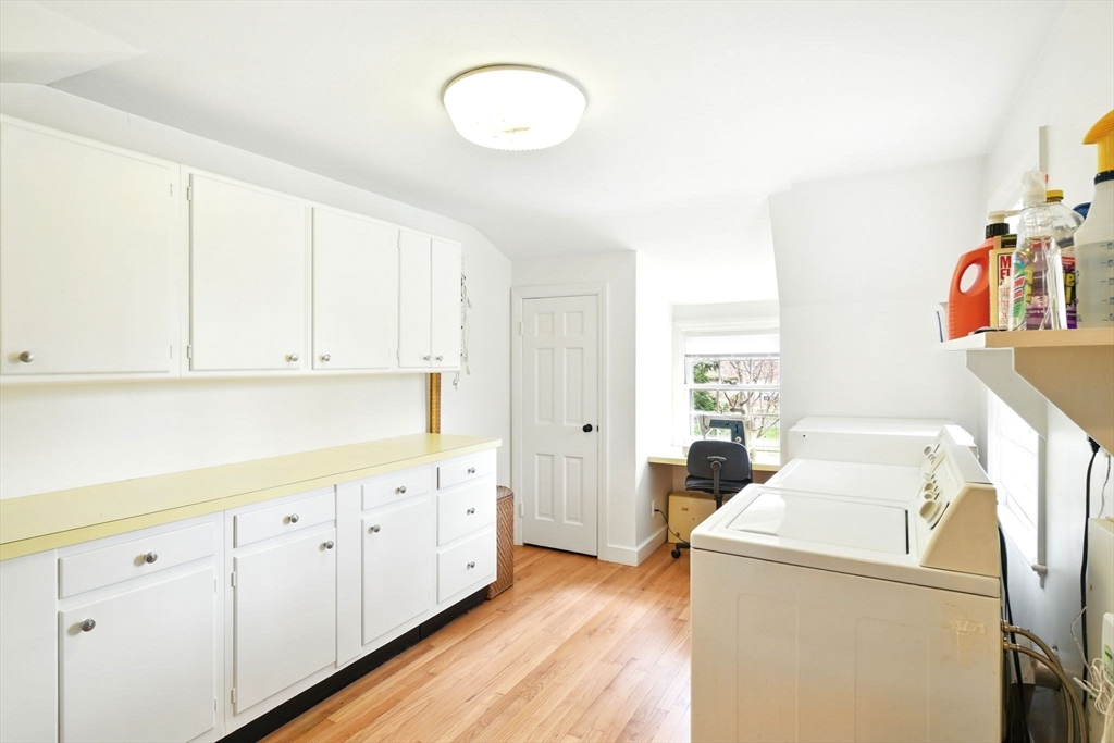 68 Normandy Road Longmeadow, MA 01106 - Photo 34 of 42 a kitchen with cabinets and wooden floor