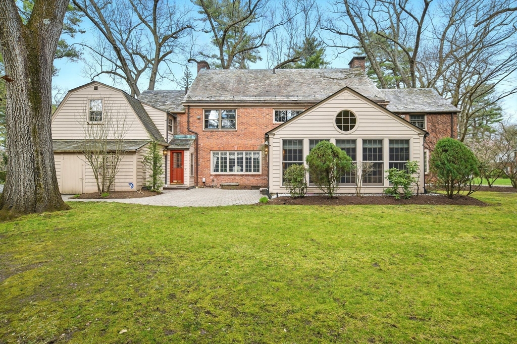 68 Normandy Road Longmeadow, MA 01106 - Photo 39 of 42 a front view of a house with a garden