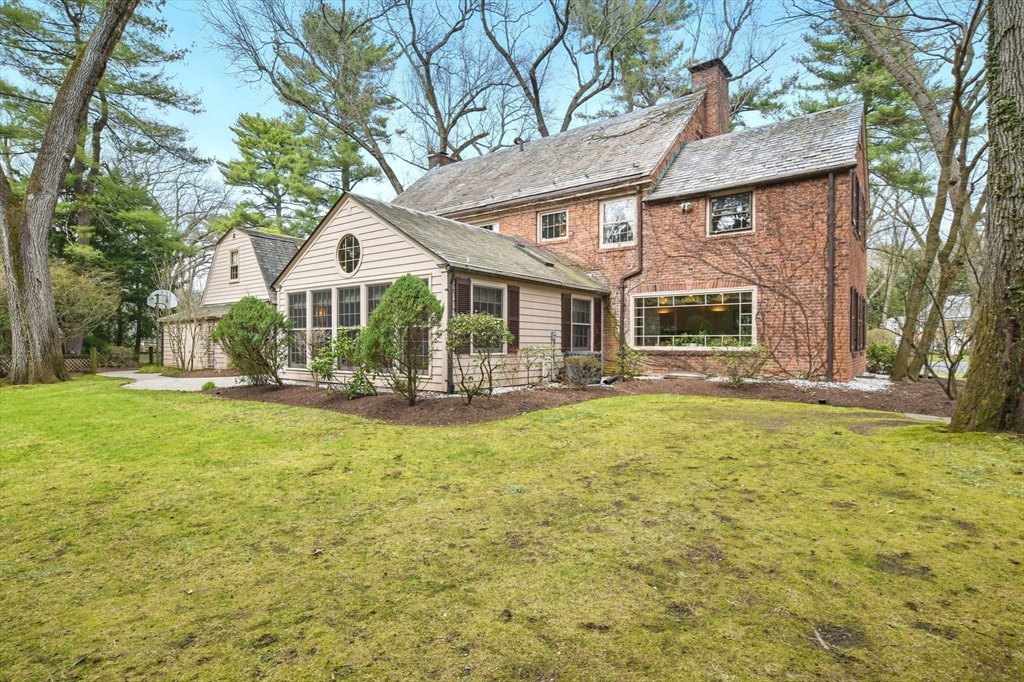 68 Normandy Road Longmeadow, MA 01106 - Photo 40 of 42 a front view of a house with a yard