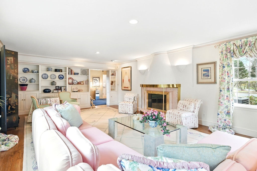 68 Normandy Road Longmeadow, MA 01106 - Photo 4 of 42 a living room with furniture large window and a fireplace