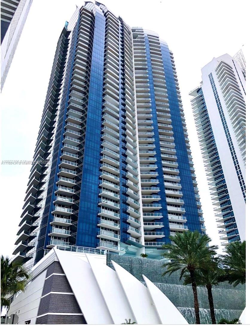 a view of outdoor space with tall buildings