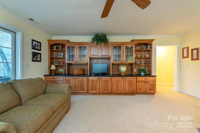 a living room with furniture and window