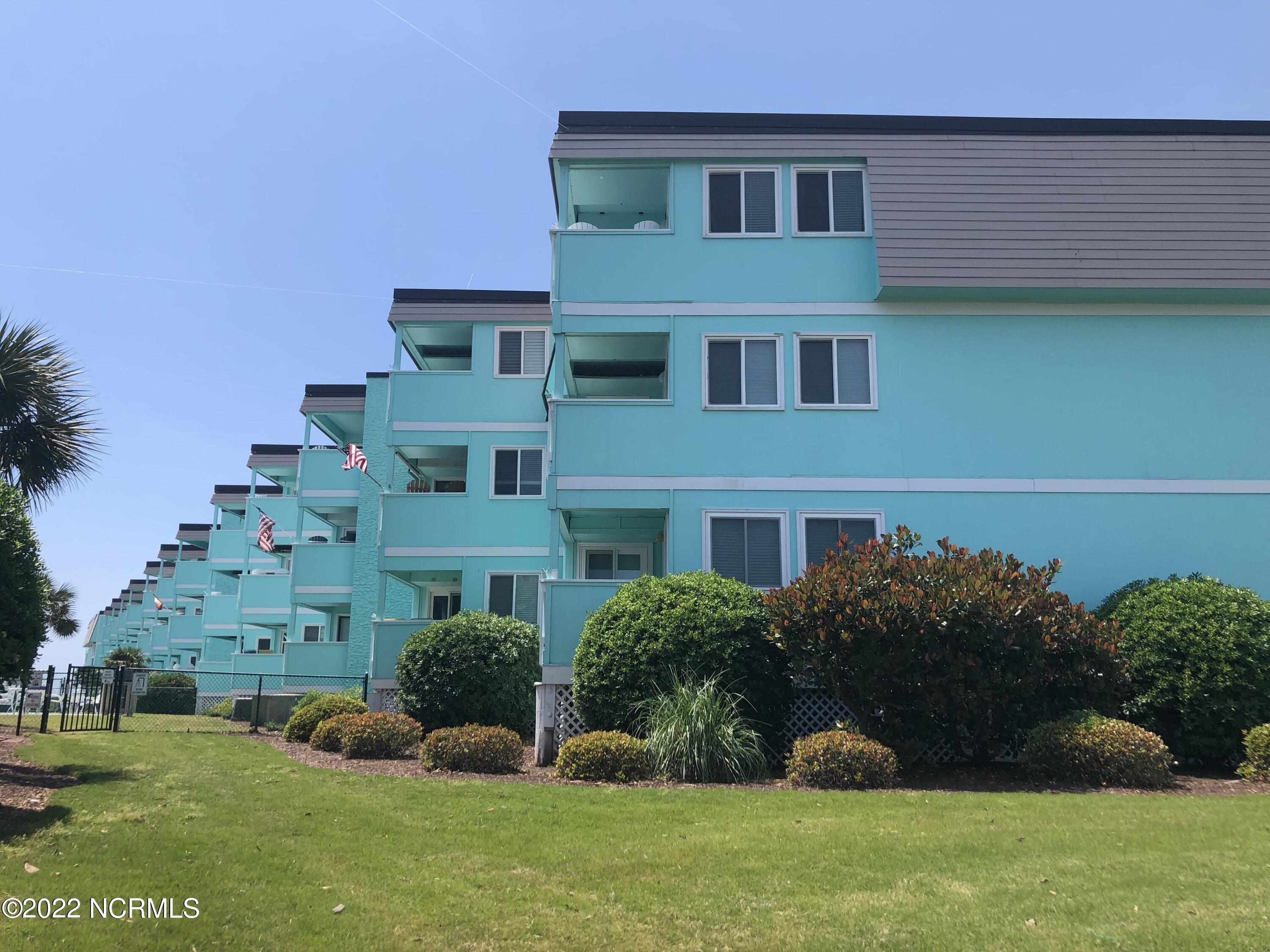 301 Commerce Way, Unit 233 Atlantic Beach, NC 28512 - Photo 1 of 11 Outside Look, 2nd story end unit