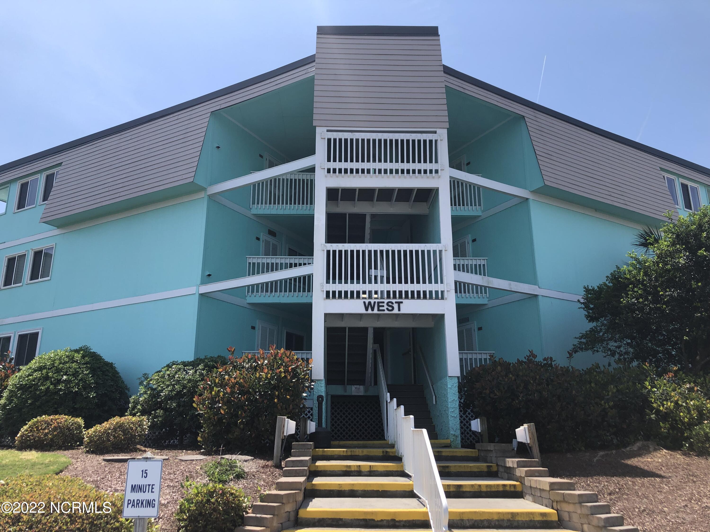 301 Commerce Way, Unit 233 Atlantic Beach, NC 28512 - Photo 3 of 11 Walking into the complex