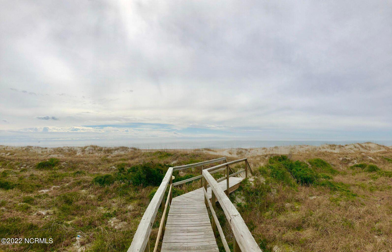 301 Commerce Way, Unit 233 Atlantic Beach, NC 28512 - Photo 7 of 11 Sea Spray boardwalk to beach