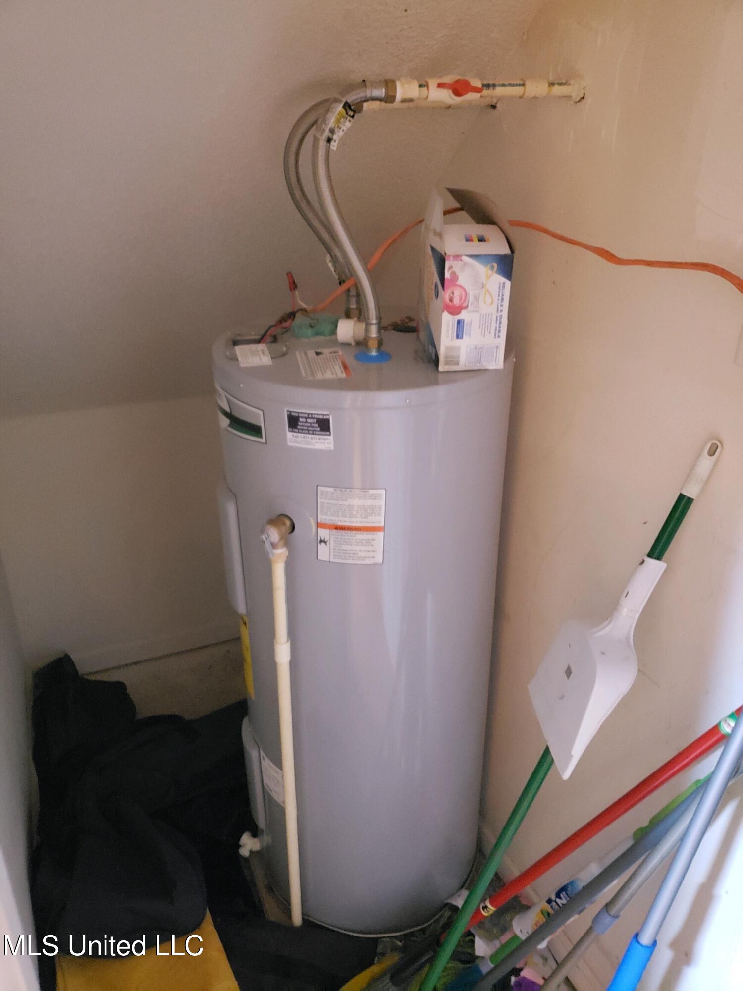 193 Chickasaw Ridge Pope, MS 38658 - Photo 11 of 23 Closet with Electric Water Heater