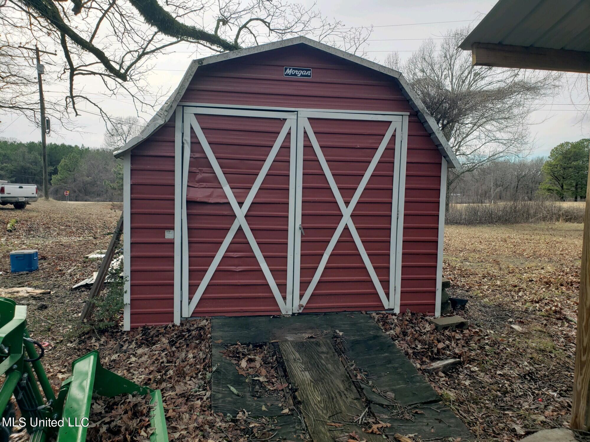 193 Chickasaw Ridge Pope, MS 38658 - Photo 4 of 23 Storage Building