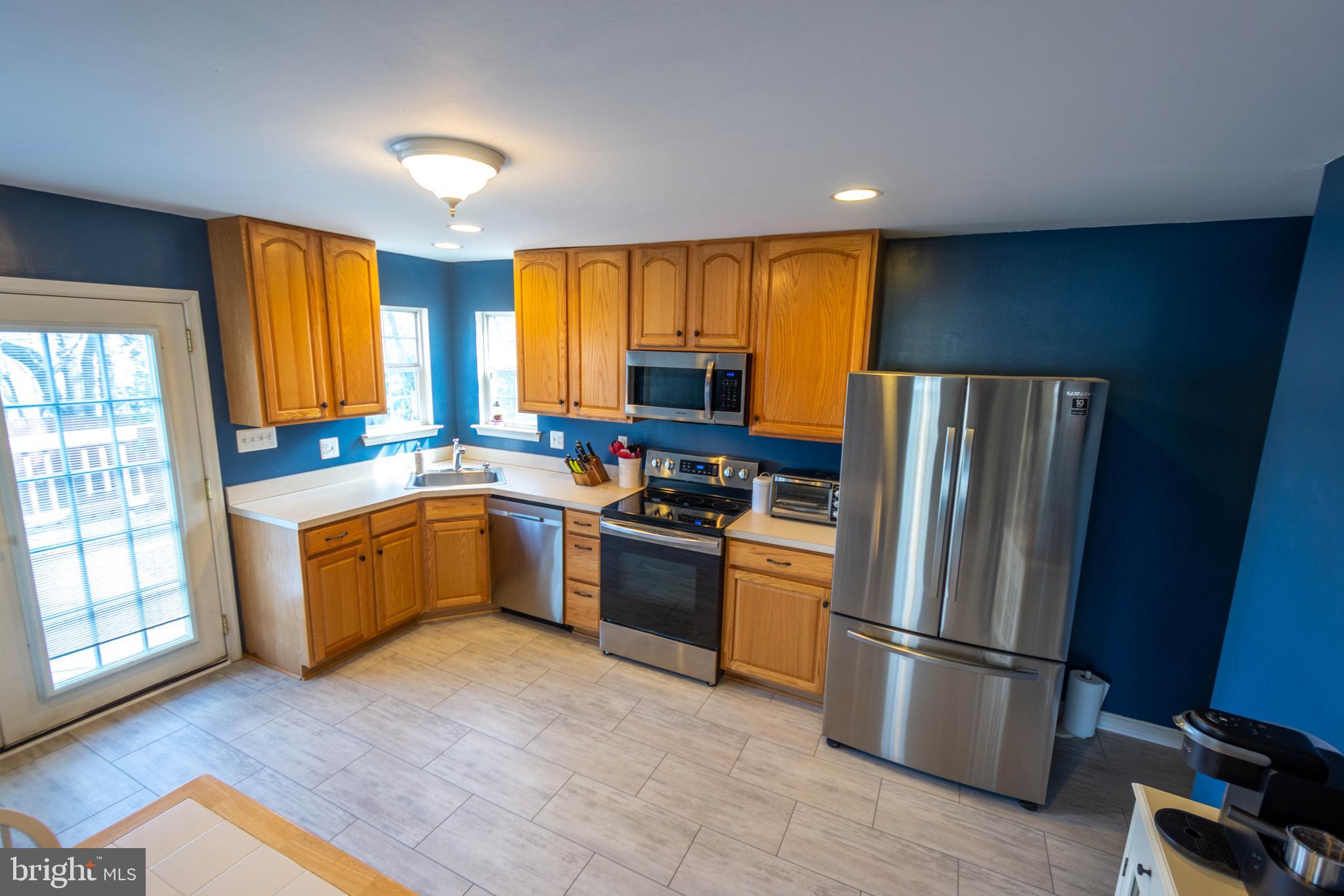 1406 Odenton Road Odenton, MD 21113 - Photo 7 of 42 Kitchen With New Vinyl Plank Floor