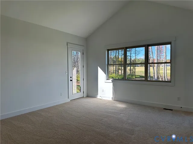 a view of balcony with wooden floor and fence