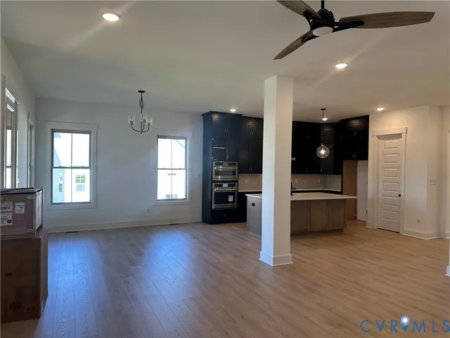 a view of a park with large trees