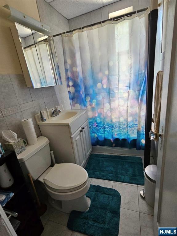 303 Hamilton Place, Unit B4 Hackensack, NJ 07601 - Photo 9 of 9 a bathroom with a toilet and a shower