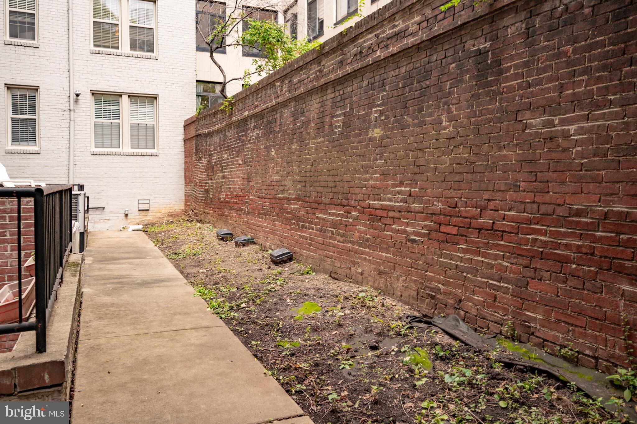 1314 Massachusetts Avenue Northwest, Unit 608 Washington, DC 20005 - Photo 29 of 40 a view of a pathway both side of building