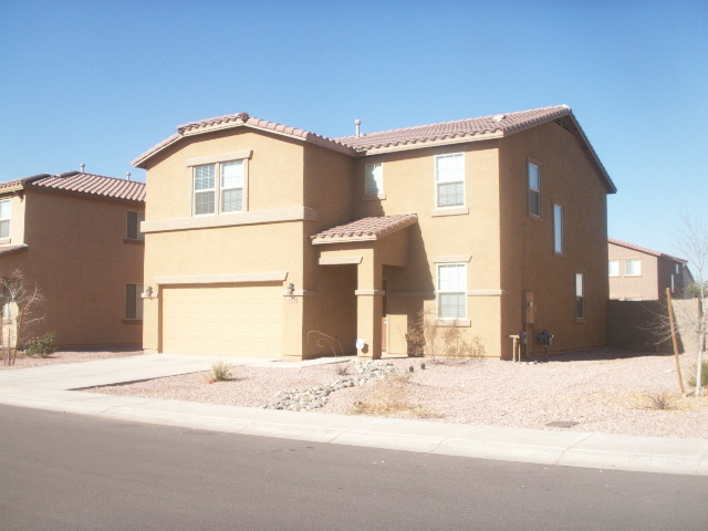 7328 West Maldonado Road Laveen, AZ 85339 - Photo 2 of 20 side