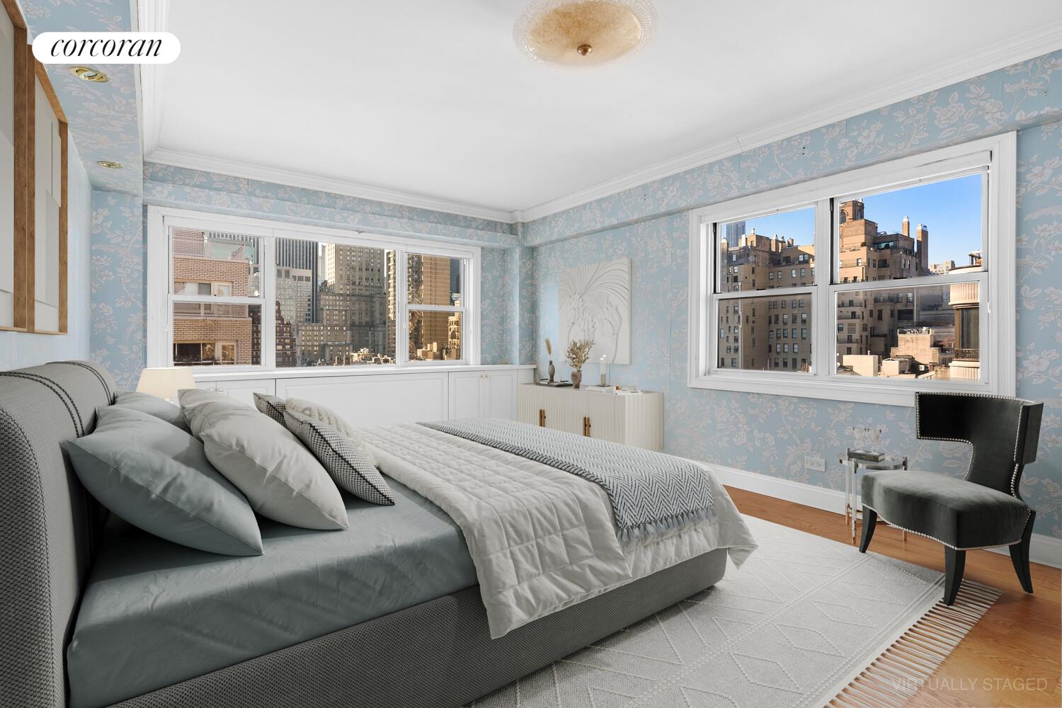 27 East 65th Street, Unit 14CD Manhattan, NY 10065 - Photo 4 of 16 a bedroom with bed and a large window