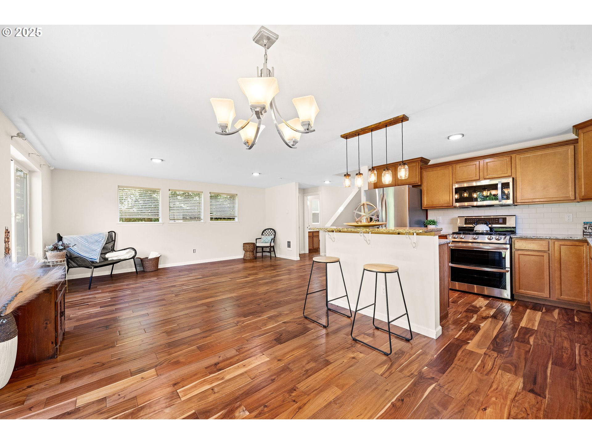 1225 3rd Avenue Hammond, OR 97121 - Photo 12 of 47 a living room with fireplace furniture and a wooden floor