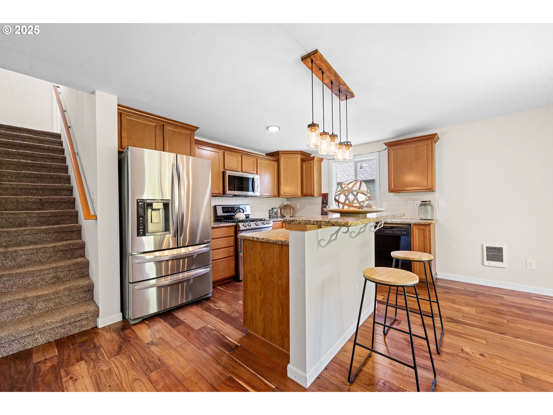 1225 3rd Avenue Hammond, OR 97121 - Photo 14 of 47 a living room with stainless steel appliances kitchen island granite countertop furniture and a kitchen view
