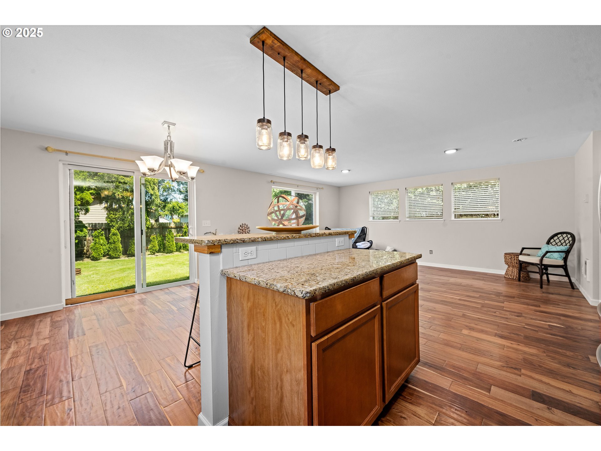1225 3rd Avenue Hammond, OR 97121 - Photo 17 of 47 a kitchen that has a lot of cabinets and wooden floor