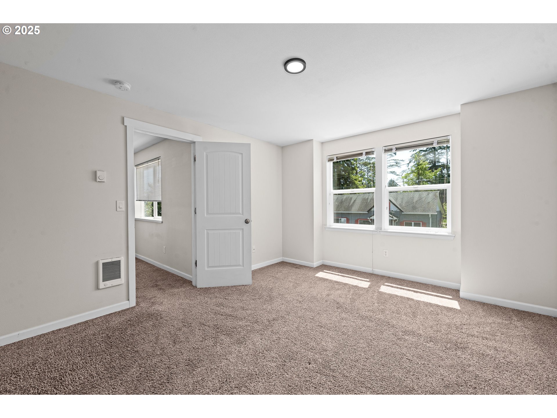 1225 3rd Avenue Hammond, OR 97121 - Photo 22 of 47 an empty room with windows and closet