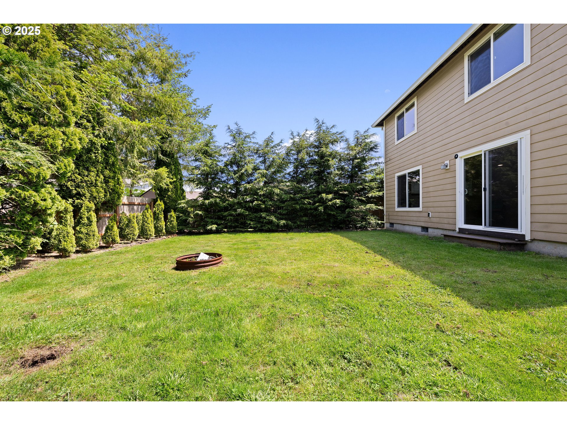 1225 3rd Avenue Hammond, OR 97121 - Photo 40 of 47 a view of a backyard with a garden