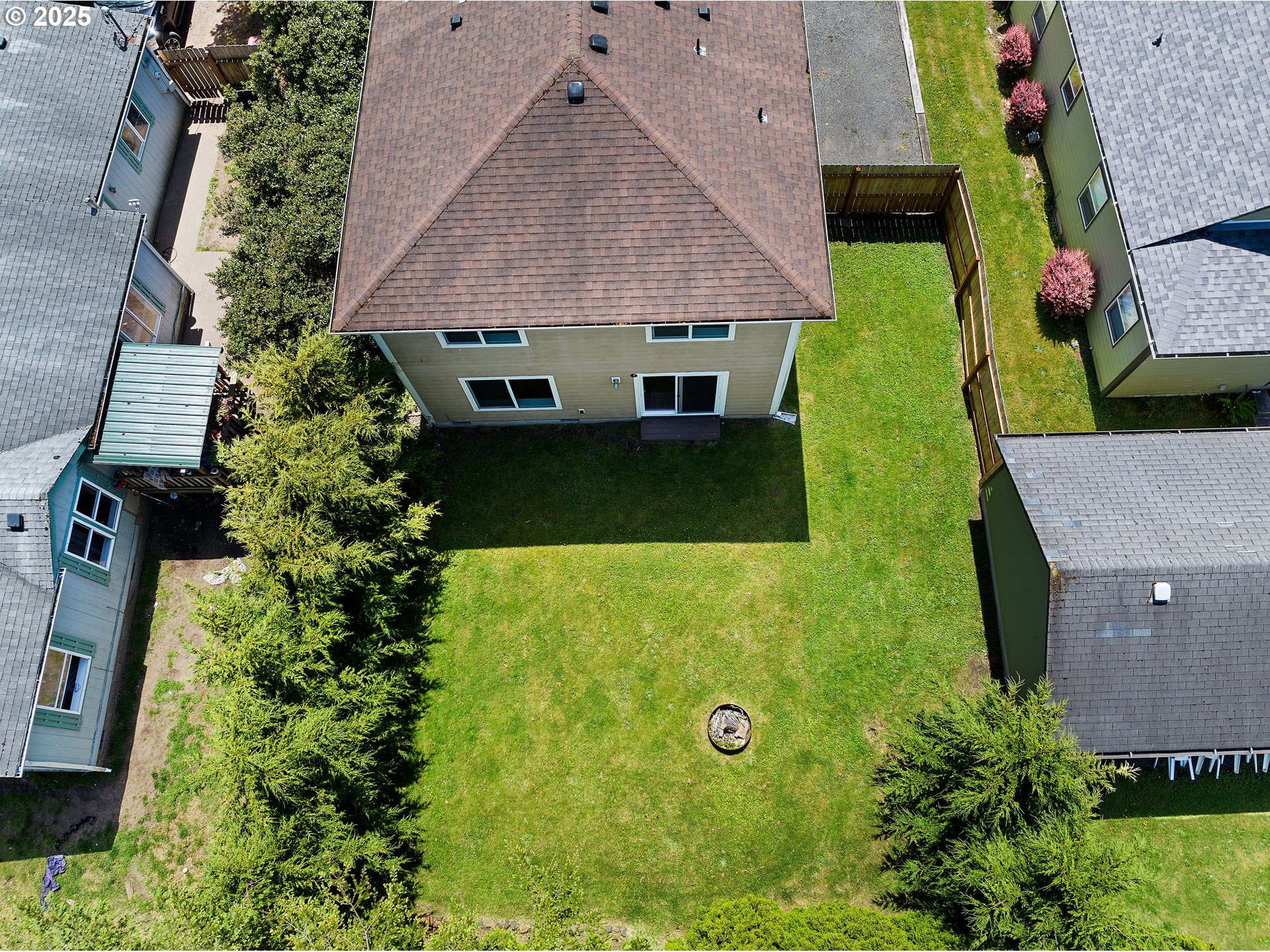 1225 3rd Avenue Hammond, OR 97121 - Photo 42 of 47 an aerial view of a house with a yard