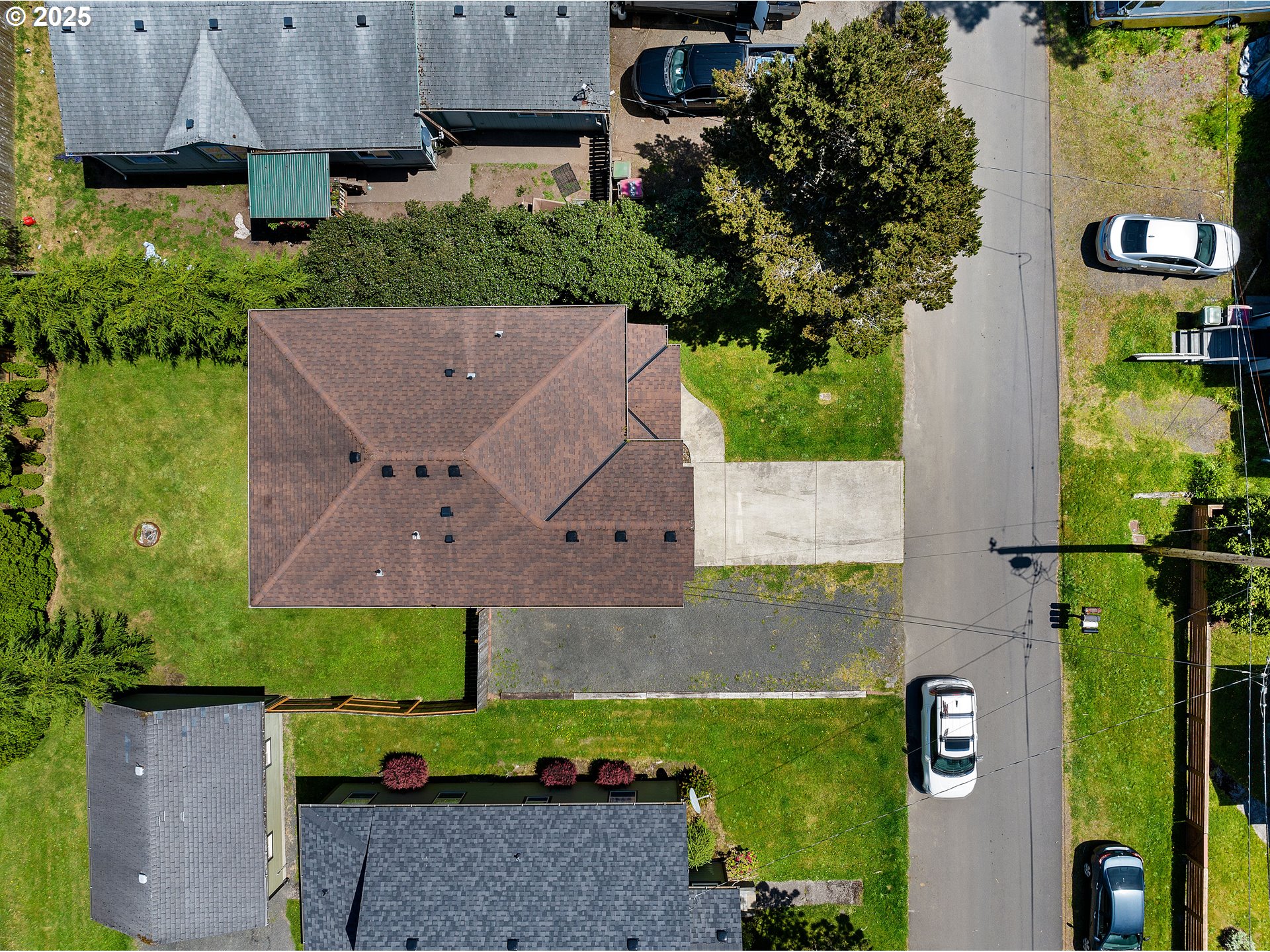1225 3rd Avenue Hammond, OR 97121 - Photo 43 of 47 an aerial view of a house with a yard