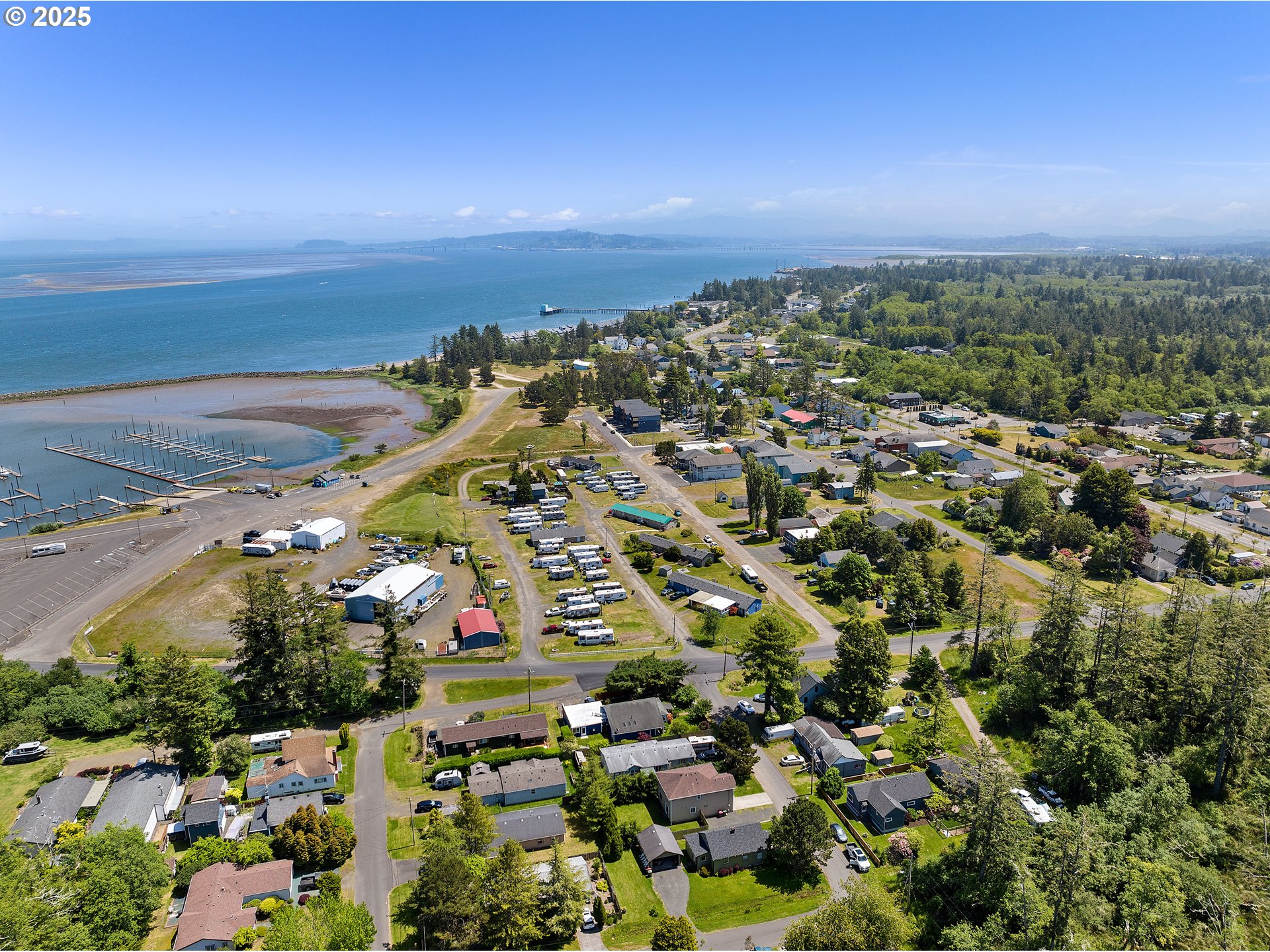 1225 3rd Avenue Hammond, OR 97121 - Photo 45 of 47 an aerial view of residential houses with outdoor space