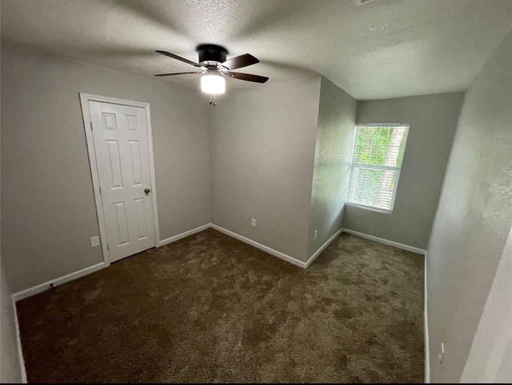 2722 Hector Street Dallas, TX 75210 - Photo 8 of 10 an empty room with windows