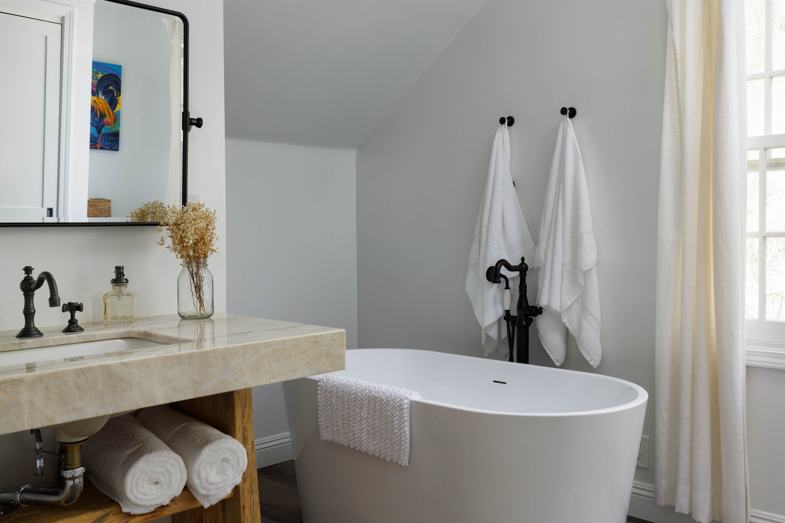65-1235 Opelo Road, Unit 5 Kamuela, HI 96743 - Photo 11 of 17 a bathroom with a sink and a mirror