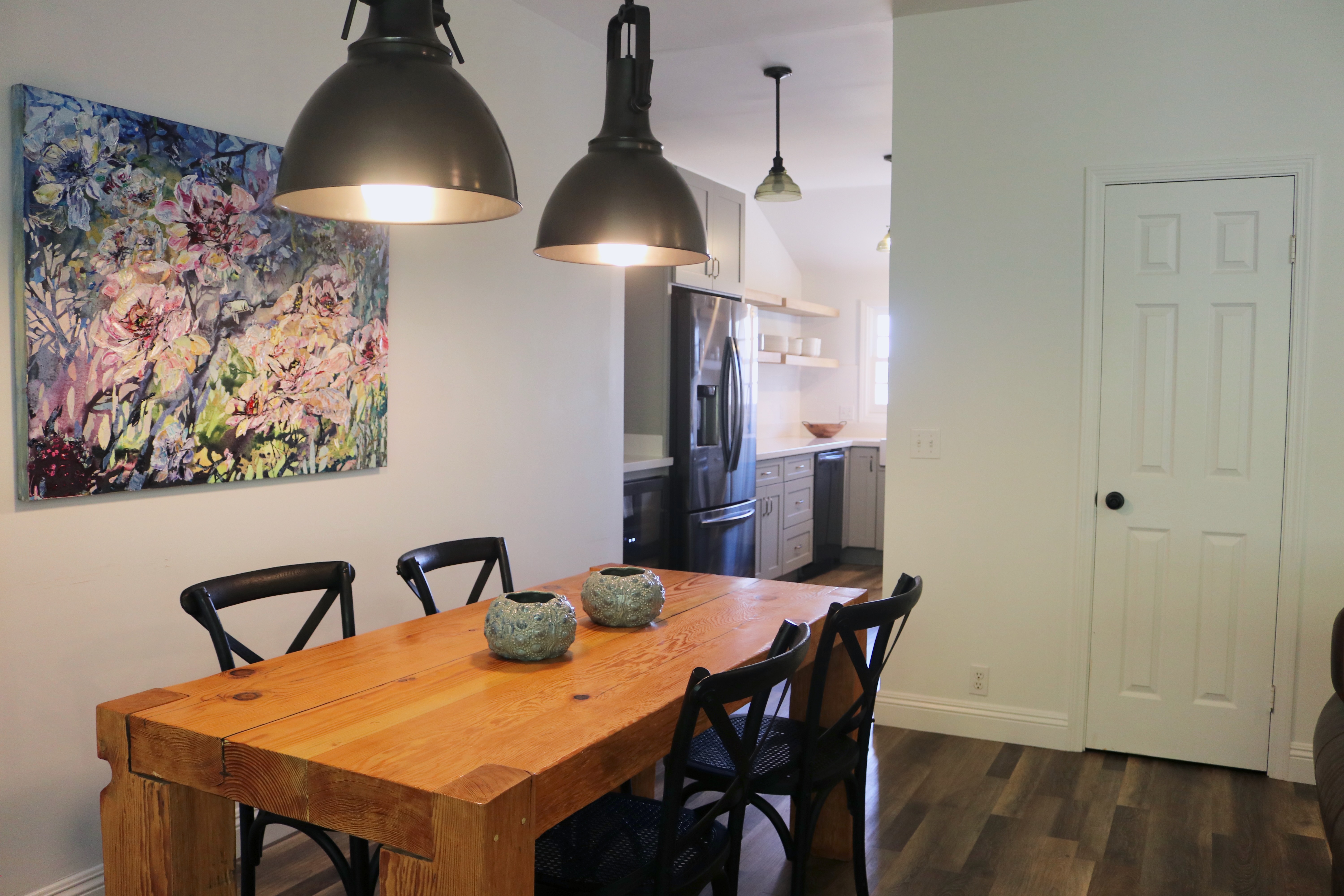 65-1235 Opelo Road, Unit 5 Kamuela, HI 96743 - Photo 5 of 17 a view of a dining room with furniture and wooden floor