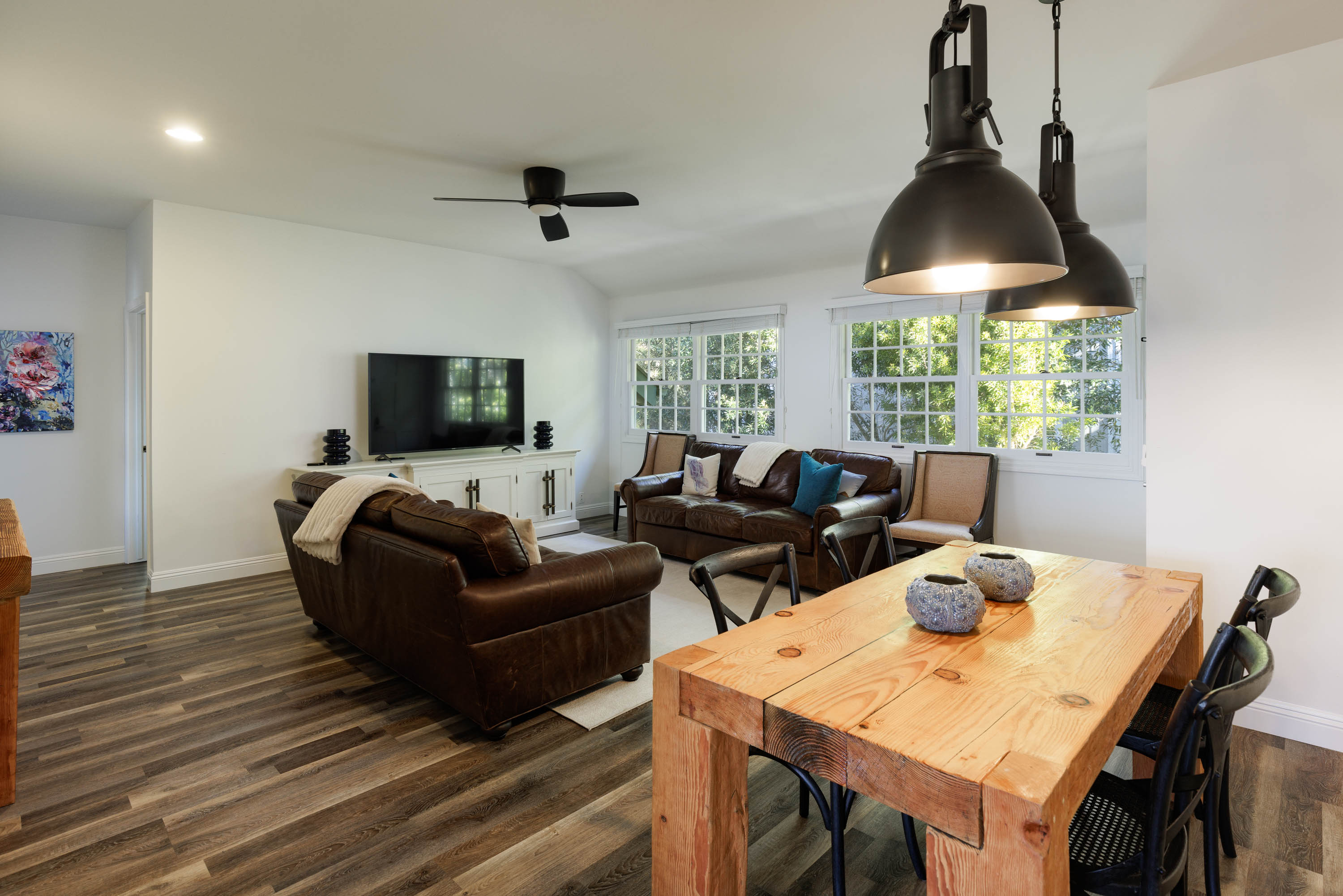 65-1235 Opelo Road, Unit 5 Kamuela, HI 96743 - Photo 7 of 17 a living room with furniture and a flat screen tv