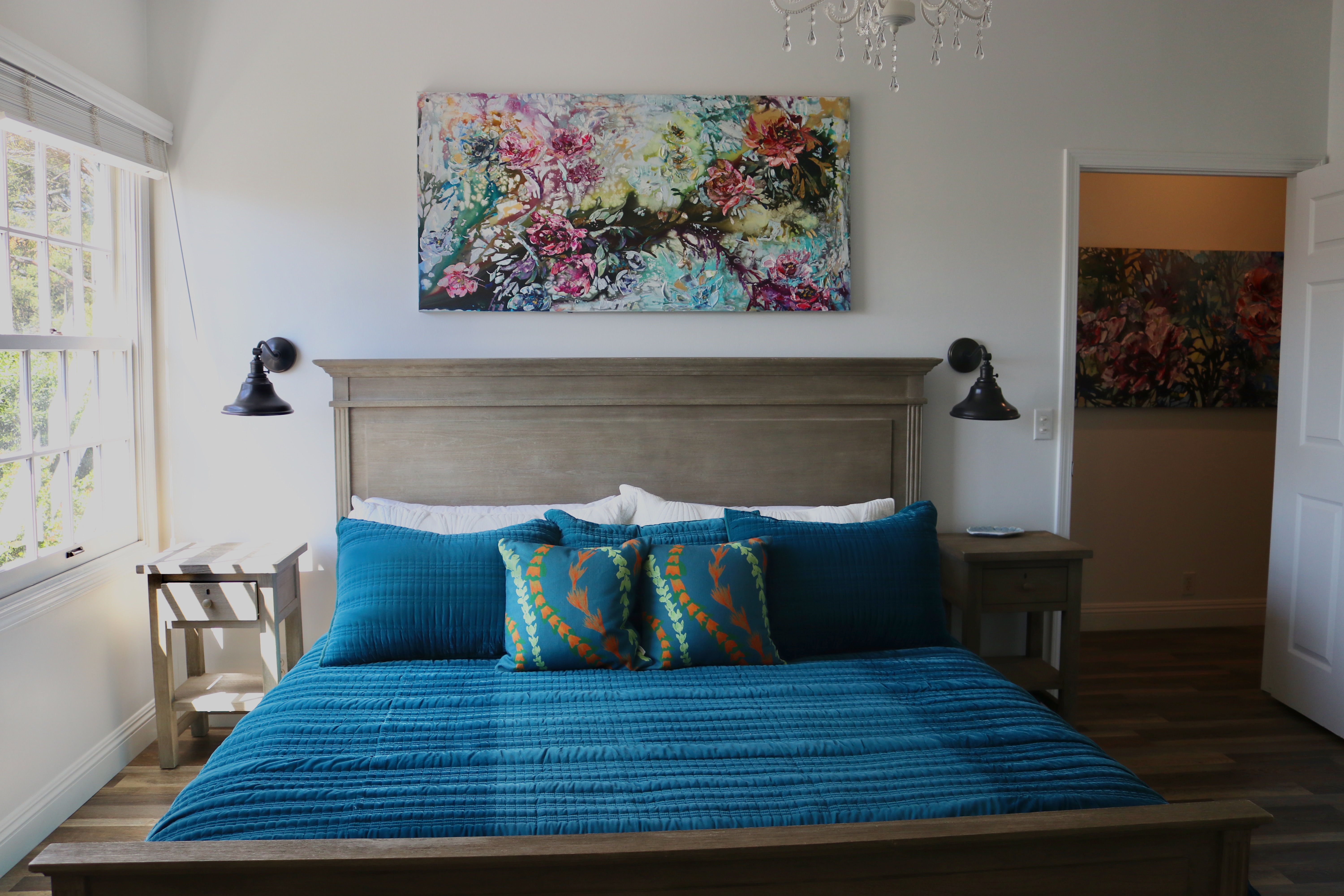 65-1235 Opelo Road, Unit 5 Kamuela, HI 96743 - Photo 9 of 17 a view of wooden floor and chair in a room