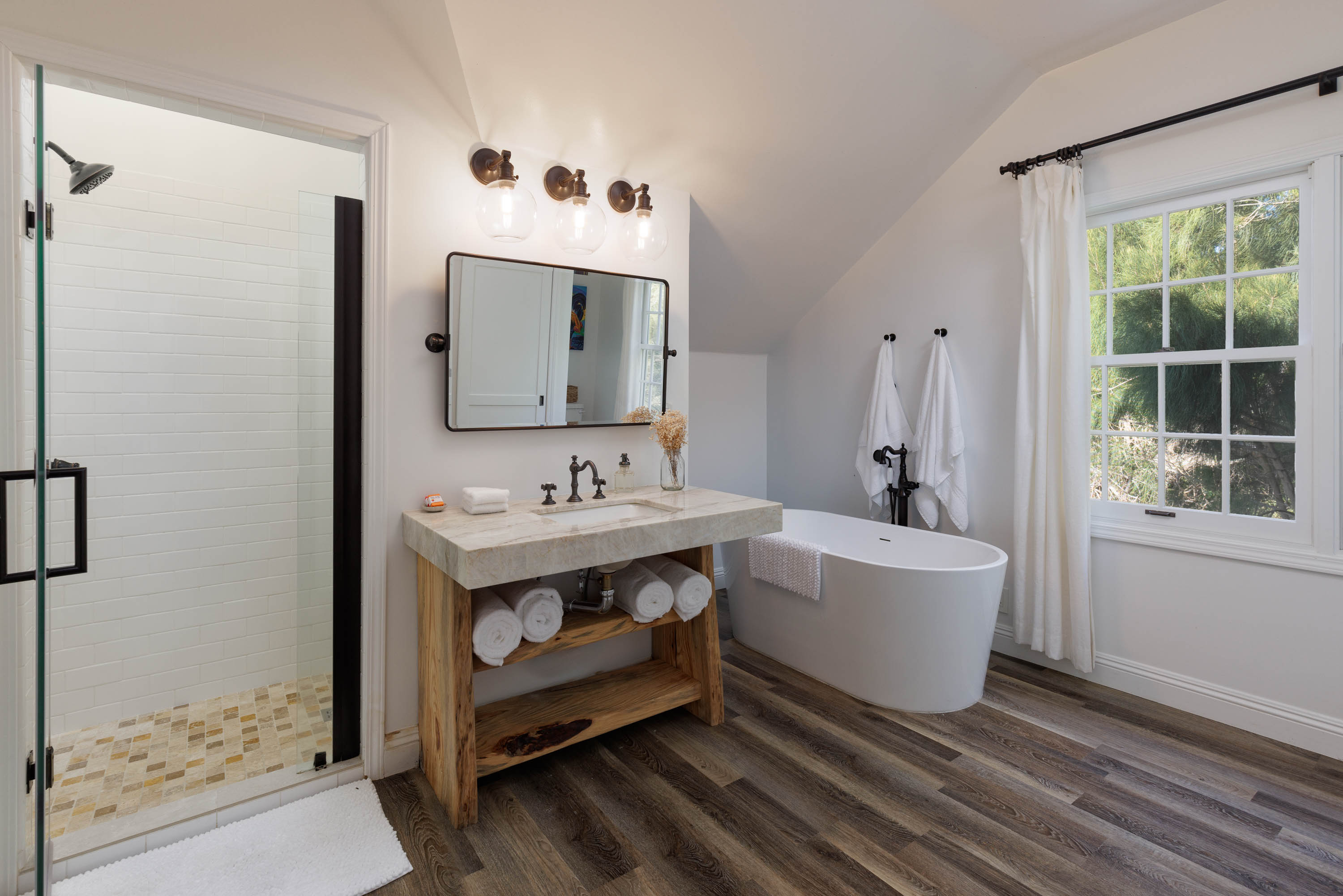 65-1235 Opelo Road, Unit 5 Kamuela, HI 96743 - Photo 10 of 17 a bathroom with a sink and a mirror