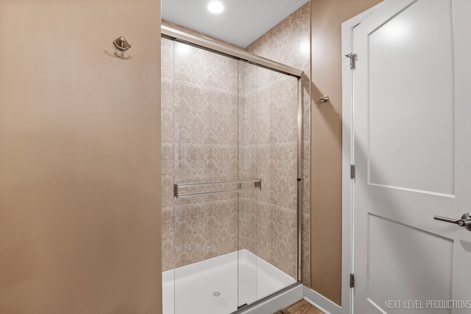 1147 Freedom Road Elburn, IL 60119 - Photo 13 of 21 a bathroom with a glass shower door