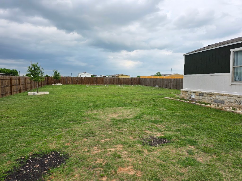 1100 Rustler Pass Kyle, TX 78640 - Photo 3 of 14 a view of a field with an trees