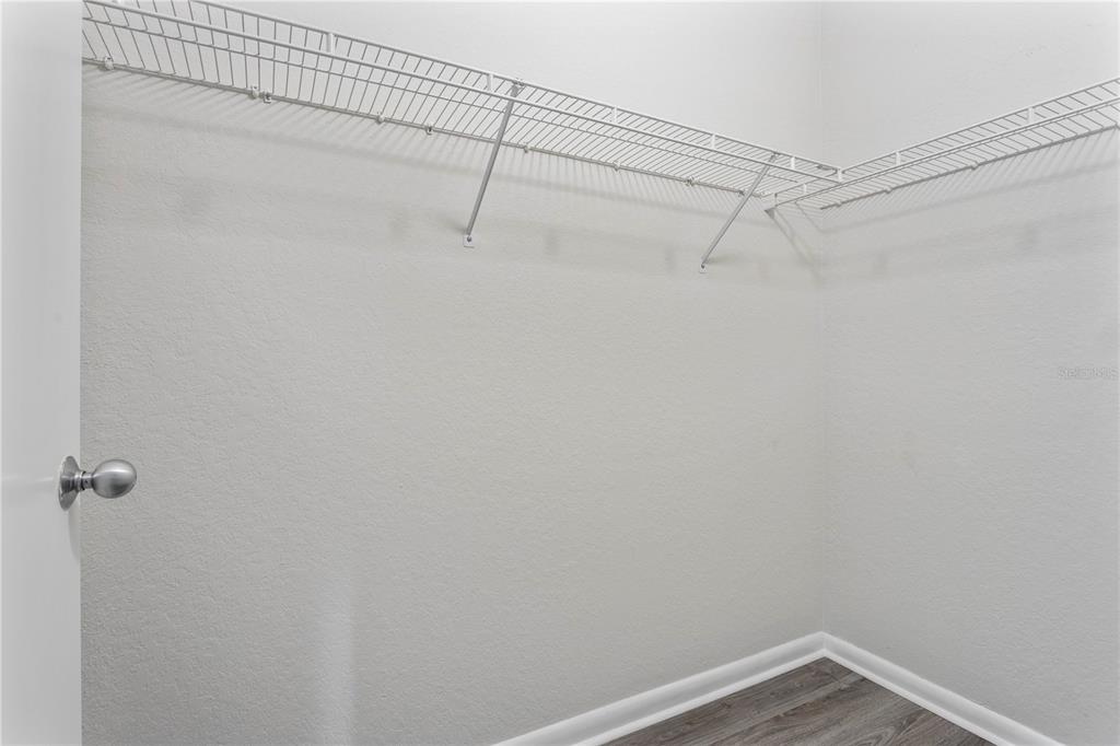 2411 West Horatio Street, Unit 522 Tampa, FL 33609 - Photo 16 of 21 a view of a room with racks on the wall
