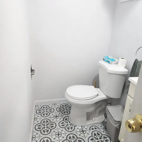 a room with gym equipment and a window