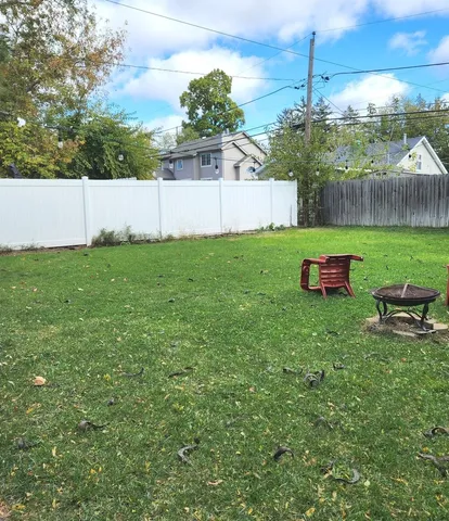 a view of a small yard from a balcony