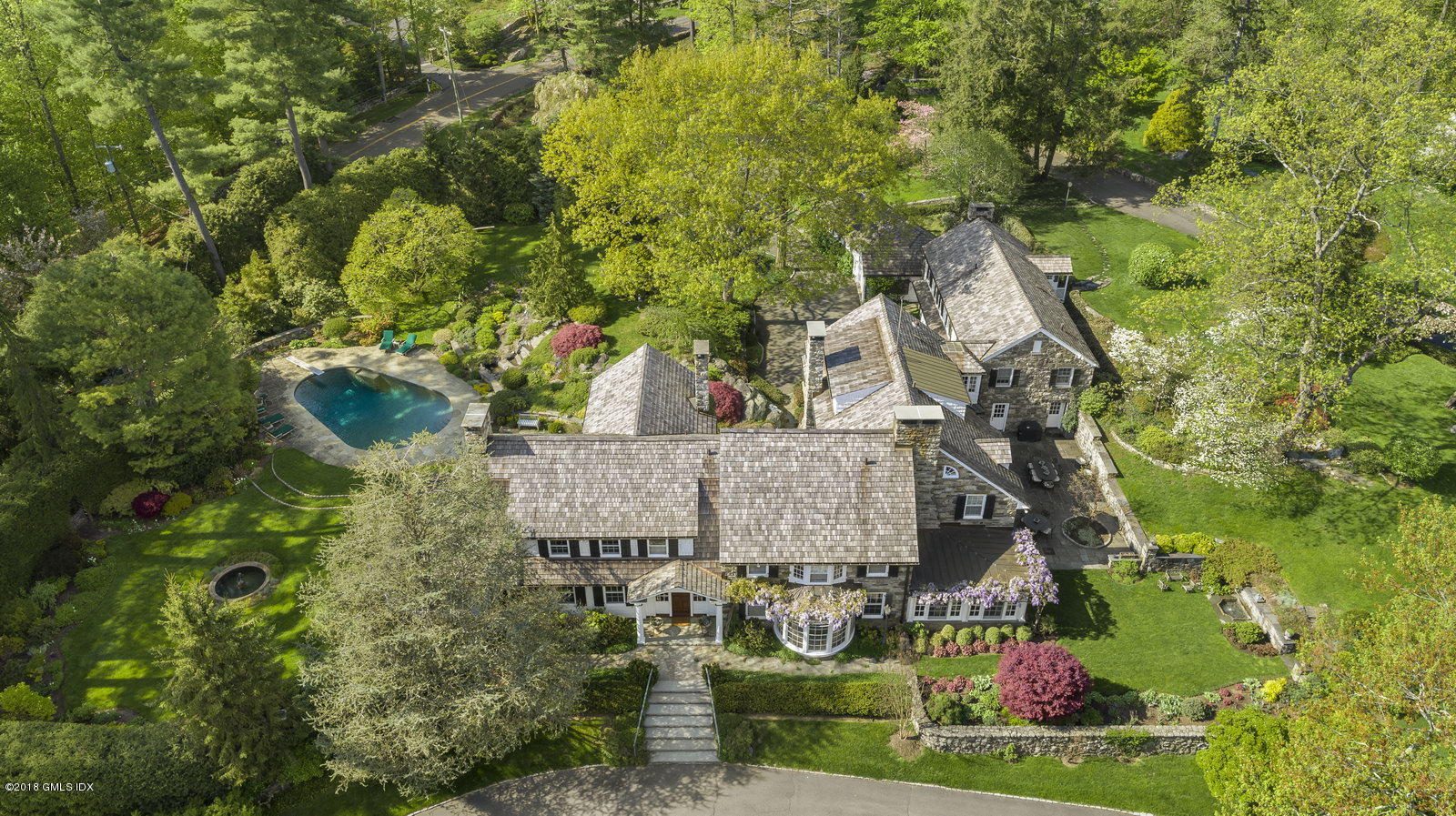 32 Pecksland Road Greenwich, CT 06831 - Photo 2 of 24 an aerial view of a house with garden space and street view