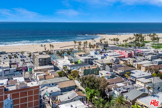 an aerial view of a city with lots of residential buildings