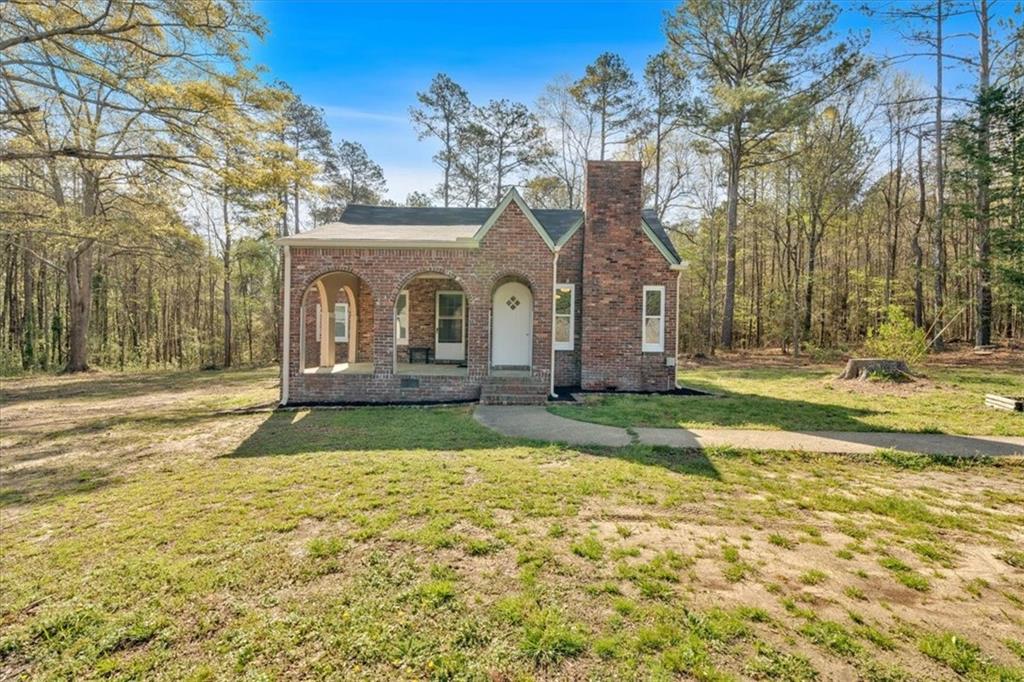 63 Wheeler Road Rockmart, GA 30153 - Photo 1 of 1 a house view with swimming pool in front of it