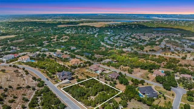 a view of city with ocean