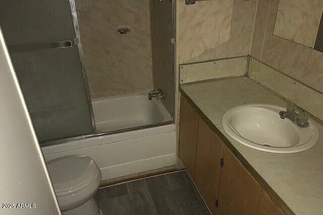 2451 West Cholla Street Apache Junction, AZ 85120 - Photo 7 of 14 a bathroom with a sink and a mirror