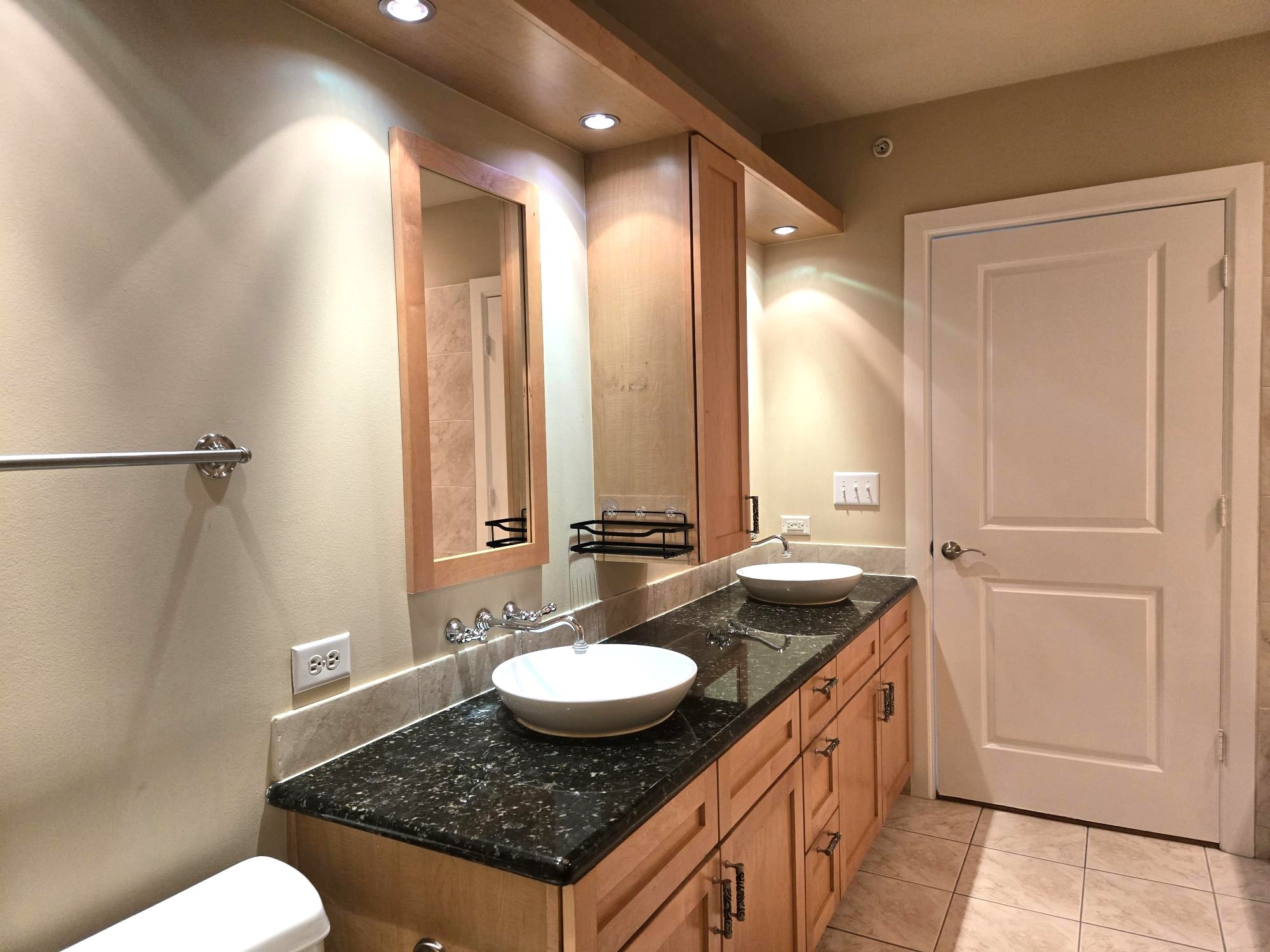 1900 Genesee Street, Unit 207 Houston, TX 77006 - Photo 25 of 50 Lots of cabinets for easy storage in main bathroom.