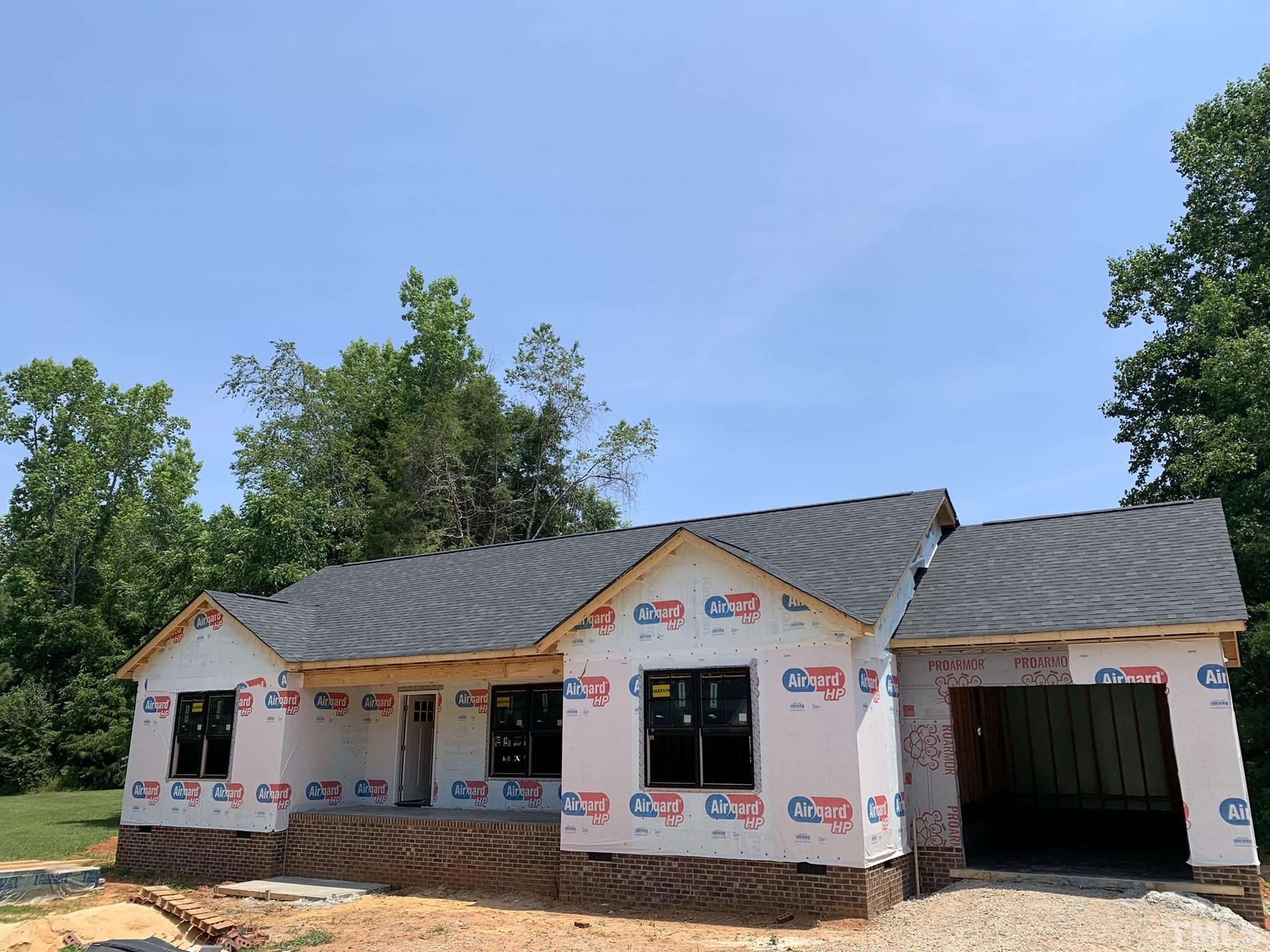9503 Meredith Drive Rougemont, NC 27572 - Photo 2 of 15 a front view of a house with a yard