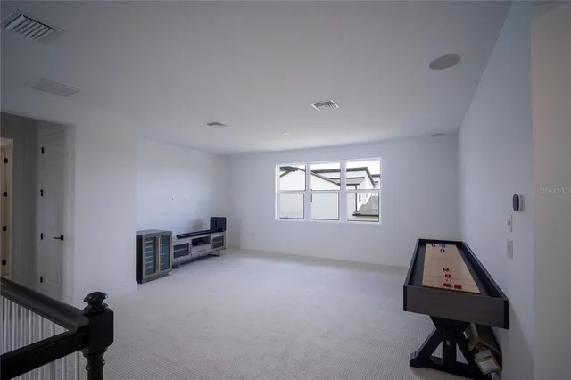 a view of hallway with stairs