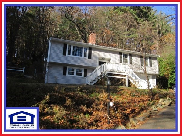 80 Murphy Road Hudson, MA 01749 - Photo 1 of 24 front view of a house with a yard