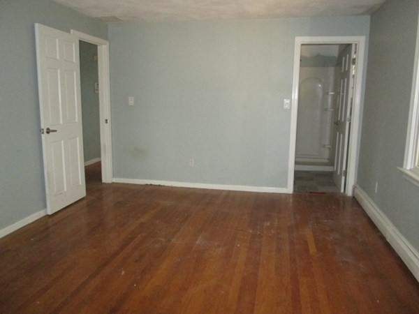 80 Murphy Road Hudson, MA 01749 - Photo 17 of 24 a view of an empty room with closet and a window