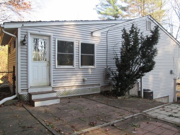 80 Murphy Road Hudson, MA 01749 - Photo 24 of 24 a view of a house with a yard