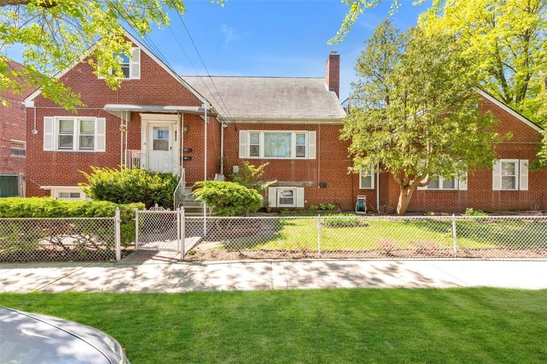 2520 Eastchester Road Bronx, NY 10469 - Photo 1 of 1 a view of a house with a yard