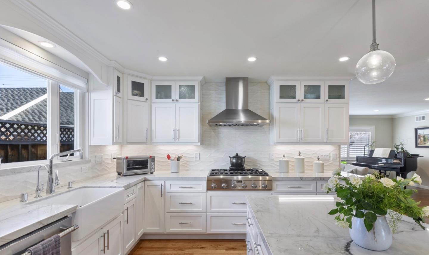 1470 Ridgeley Drive Campbell, CA 95008 - Photo 5 of 12 a kitchen with stainless steel appliances granite countertop a sink a stove and cabinets